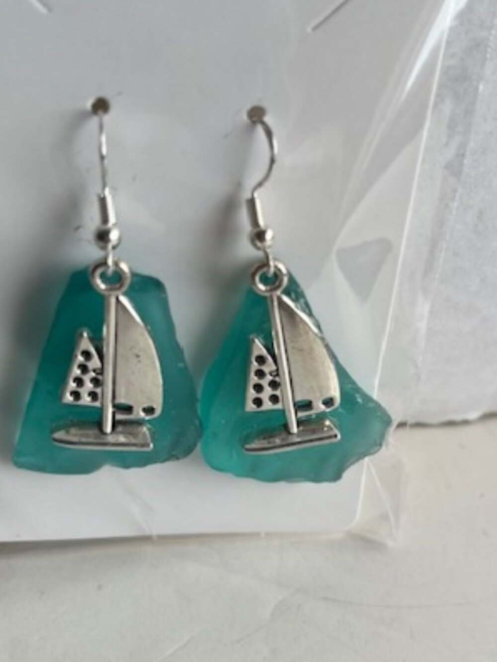 Sea glass earrings in nautical style.